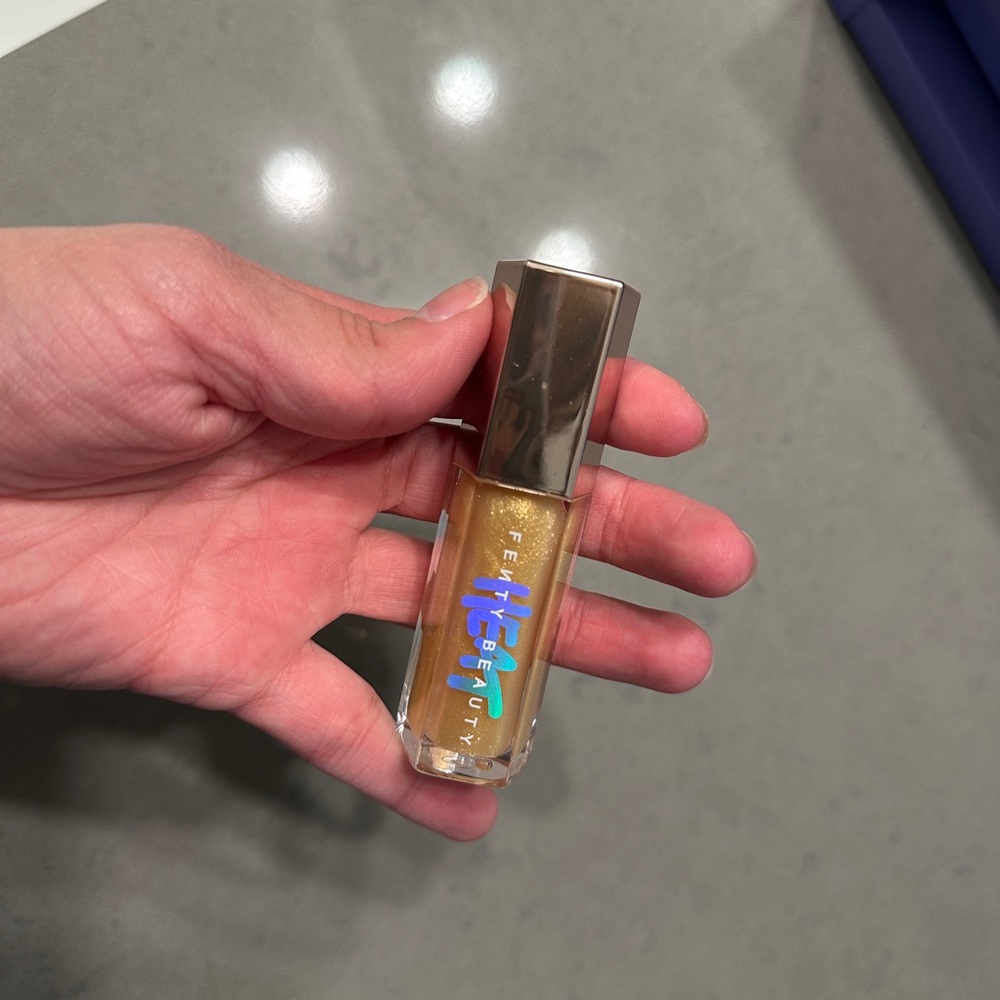FENTY BEAUTY Gloss Bomb Heat Universal Lip Luminizer Plumper in Lemon Lava ($26)